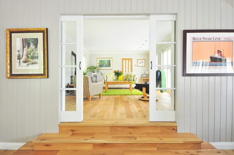 Cozy living room with wooden flooring, showcasing how to choose the right flooring for a welcoming space.